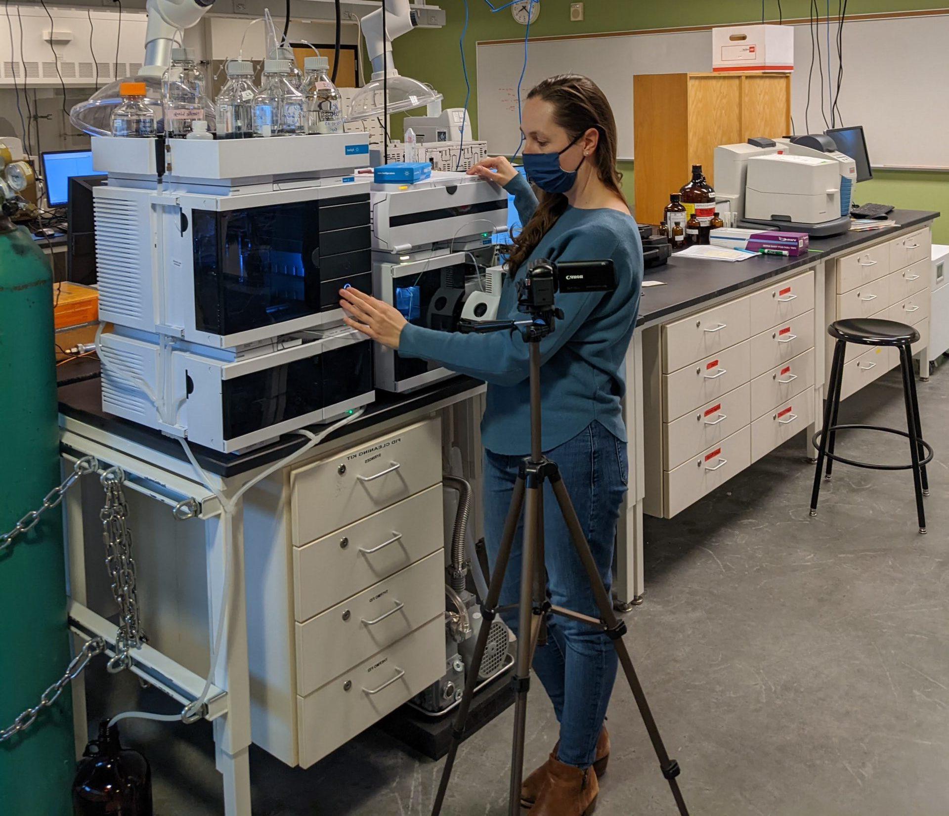 Dr. Alycia Palmer recording videos about the LC-MS in the chemistry department